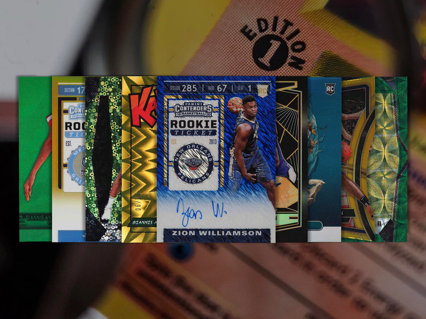 Image of eight overlapping raw insert cards including a Zion Williamson Blue Shimmer Auto, a Gold Kaboom, a Green PMG, a Downtown, a Die-cut card, and others